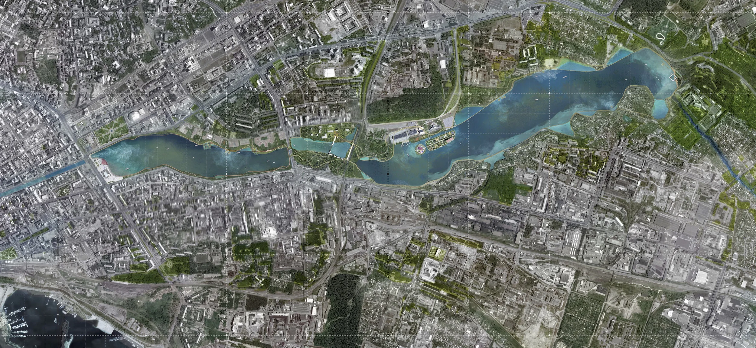 Вид города с воздуха: река и городская застройка.